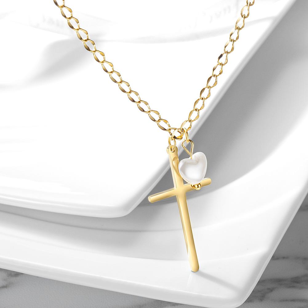 Cross and pearl heart necklace