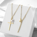 Cross and pearl heart necklace