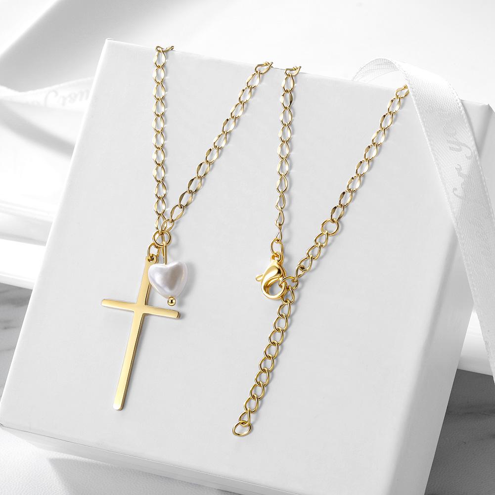 Cross and pearl heart necklace